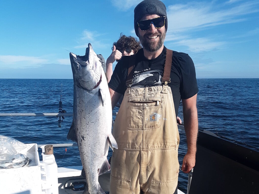 Man holding king salmon